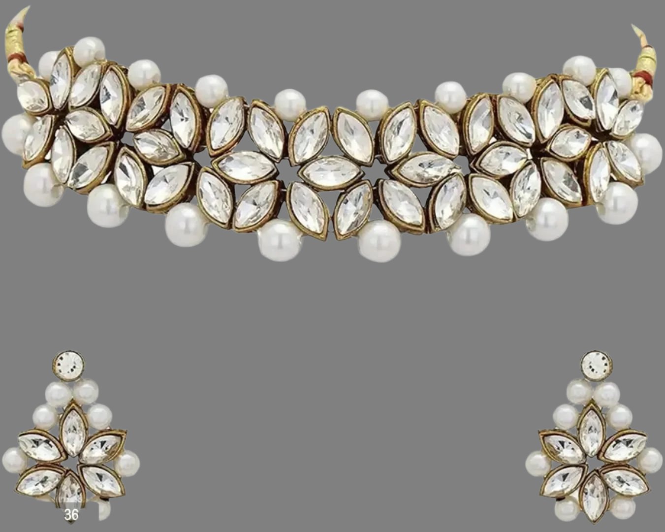 Beautiful Alloy Choker set for women
Color:  White and gold
Material: Alloy
Country of Origin: INDIA
Enhance your style with our Beautiful Alloy Choker set for women. Made with high-quality alloy, it is perfect for adding a touch of elegance to any outfit. The sleek design and durability make it a must-have accessory for any fashion-forward woman. Embrace your beauty with this stunning choker set.